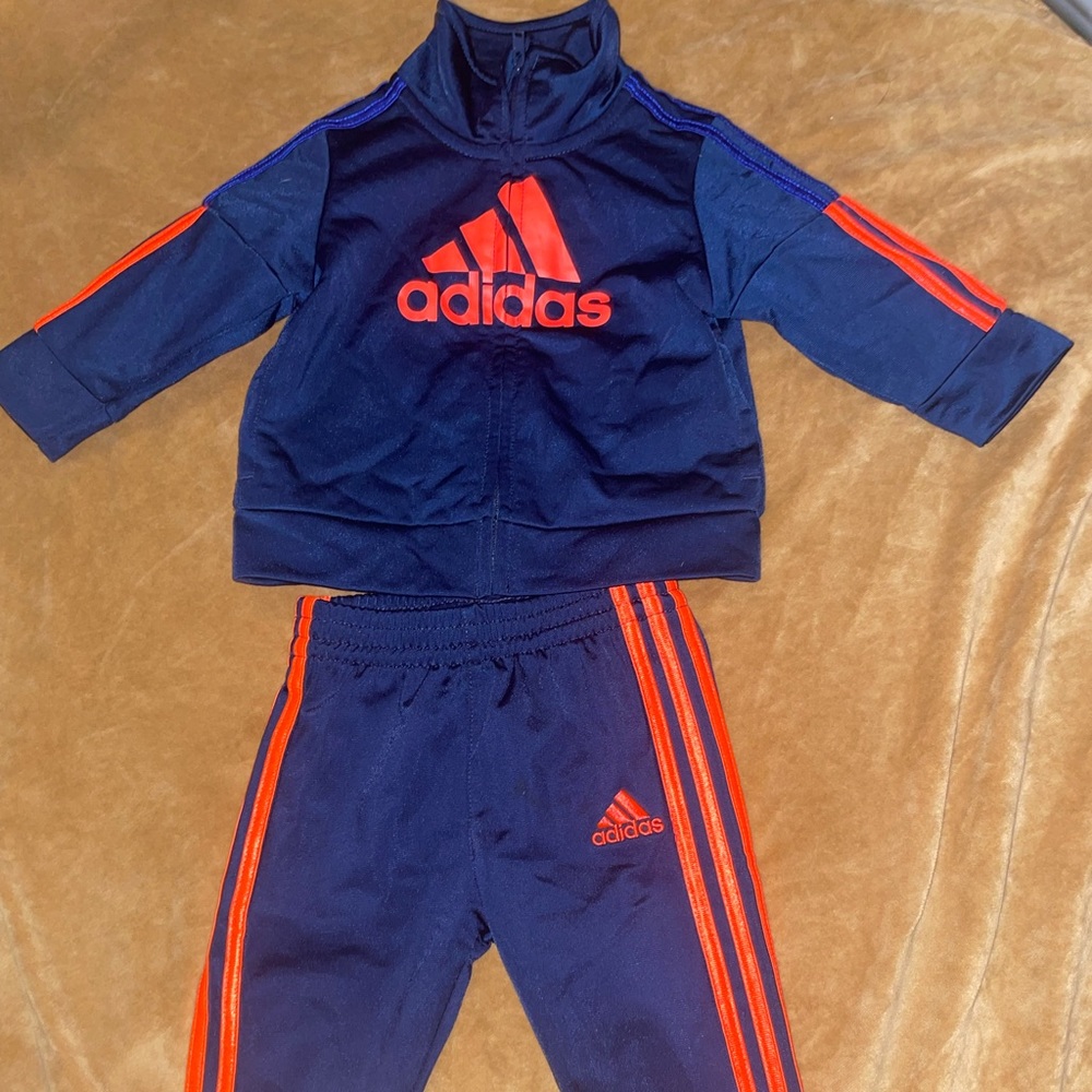 Two piece adidas track suit